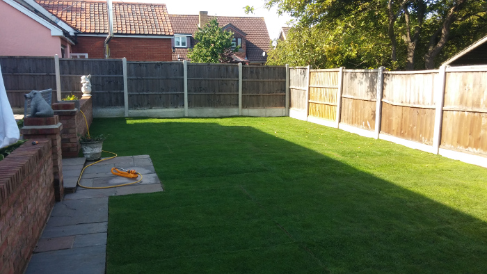 Clearance of existing garden, construction of new decking and laying of fresh turf in Brentwood